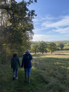Chiropractor Catherine enjoys a glorious autumn walk with her friends. 